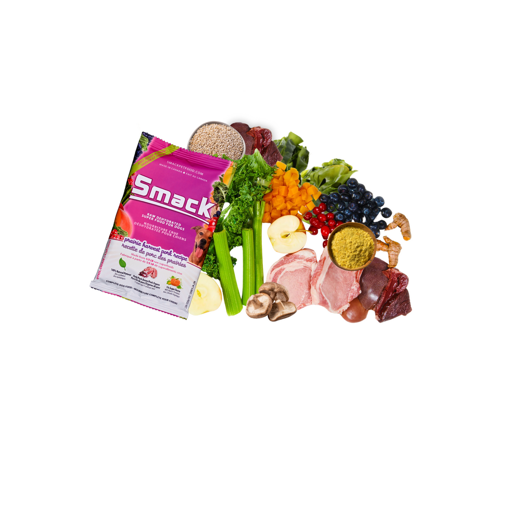 Smack product packaging surrounded by various fruits and vegetables on a white background